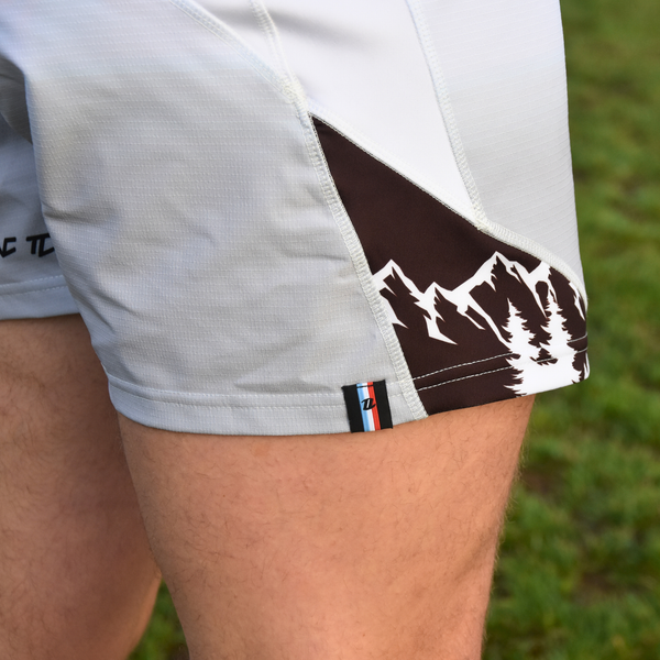 Détail short rugby Signature L'Alpin matière technique premium