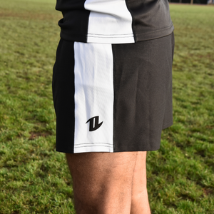 Détail short rugby noir matière technique respirante